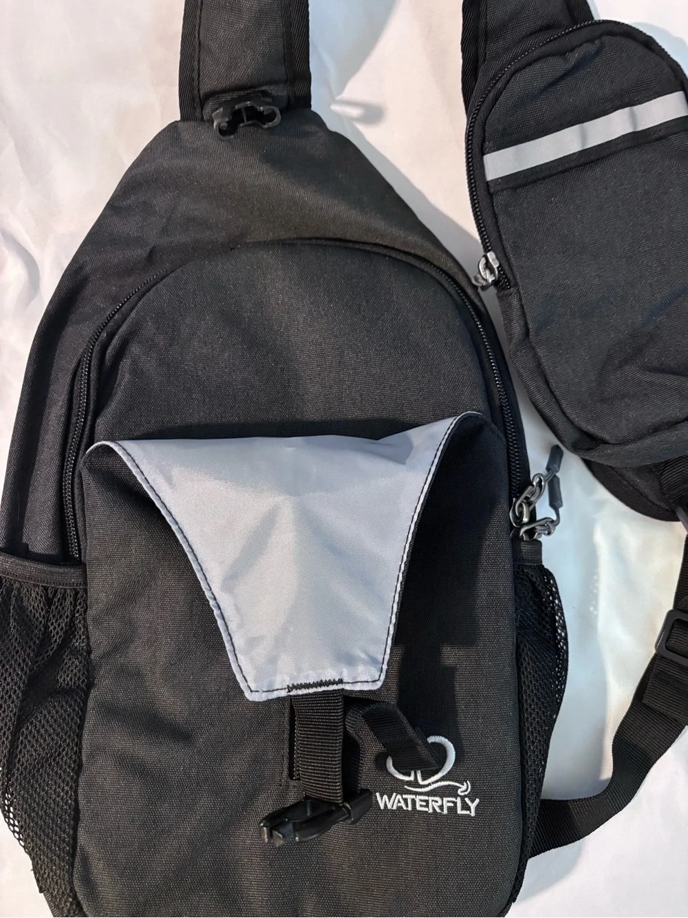 Waterfly Black Sling Backpack Crossbody Travel Bag Side Elastic Mesh Pockets